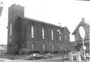 Side view of First Baptist Church. 1960's. Staff photographer of the Sunday Dispatch. Courtesy of the Greater Pittston Historical Society.